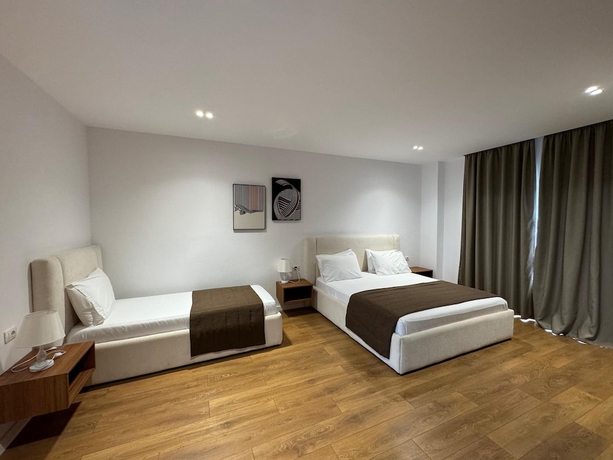 Imagen de la habitación del Hotel ORCHIDS. Foto 7
