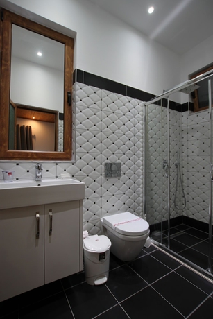 Imagen de la habitación del Hotel ORCHIDS. Foto 12
