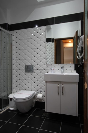 Imagen de la habitación del Hotel ORCHIDS. Foto 16