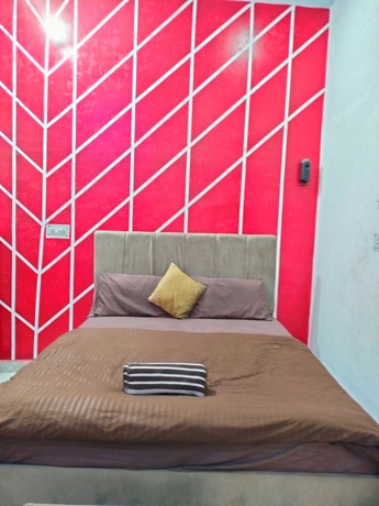 Imagen de la habitación del Hotel ORS Guest House Ayodhya. Foto 15