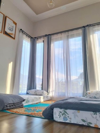 Imagen de la habitación del Hotel OSH Omah Syariah Homestay. Foto 5