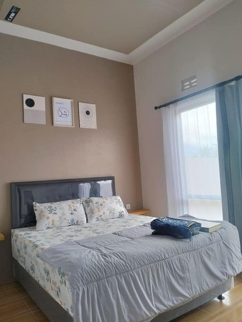 Imagen de la habitación del Hotel OSH Omah Syariah Homestay. Foto 6