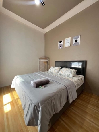 Imagen de la habitación del Hotel OSH Omah Syariah Homestay. Foto 7