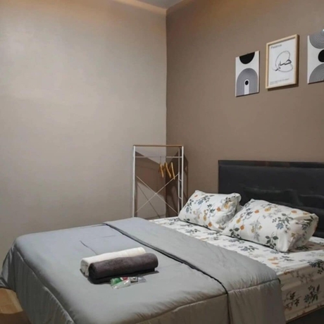 Imagen de la habitación del Hotel OSH Omah Syariah Homestay. Foto 9