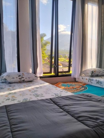 Imagen de la habitación del Hotel OSH Omah Syariah Homestay. Foto 10