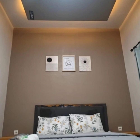 Imagen de la habitación del Hotel OSH Omah Syariah Homestay. Foto 11