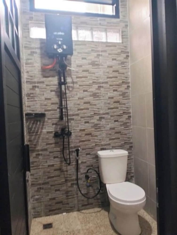 Imagen de la habitación del Hotel OSH Omah Syariah Homestay. Foto 12