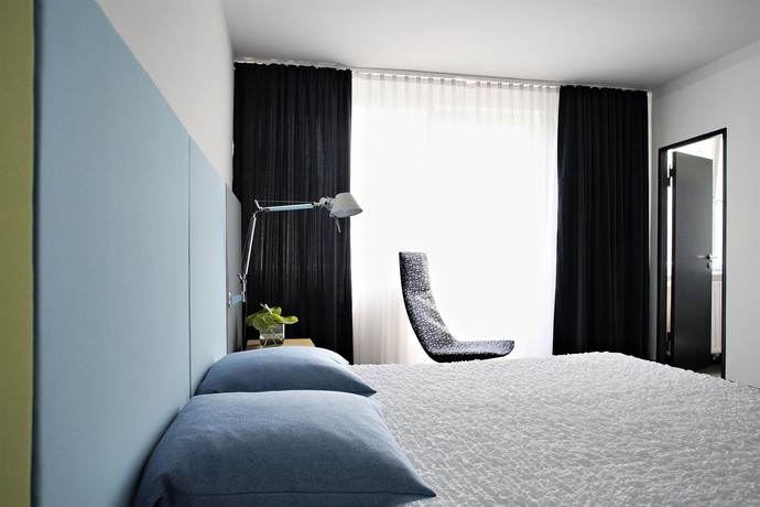 Imagen de la habitación del Hotel OTTO. Foto 13