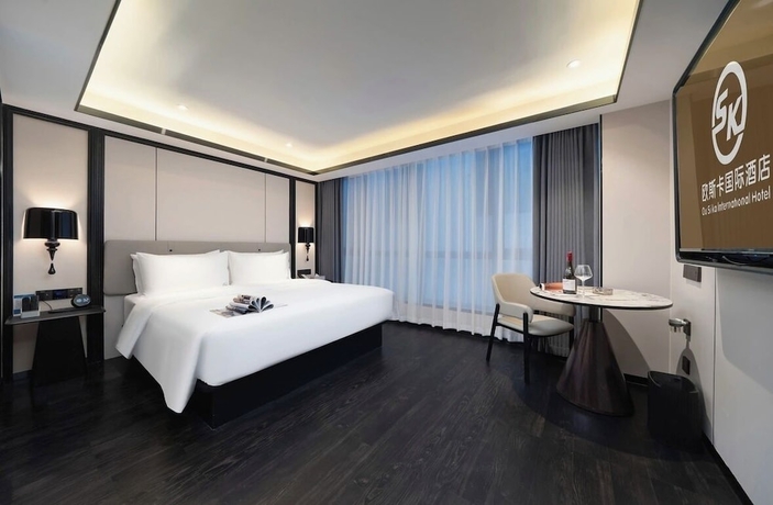Imagen de la habitación del Hotel OU SI KA HOTEL - HUIYANG. Foto 2
