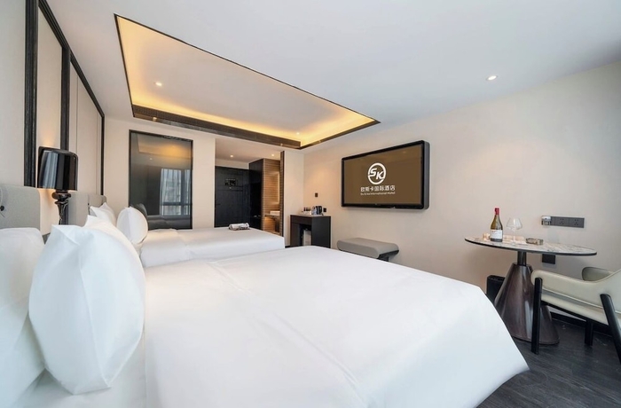 Imagen de la habitación del Hotel OU SI KA HOTEL - HUIYANG. Foto 3