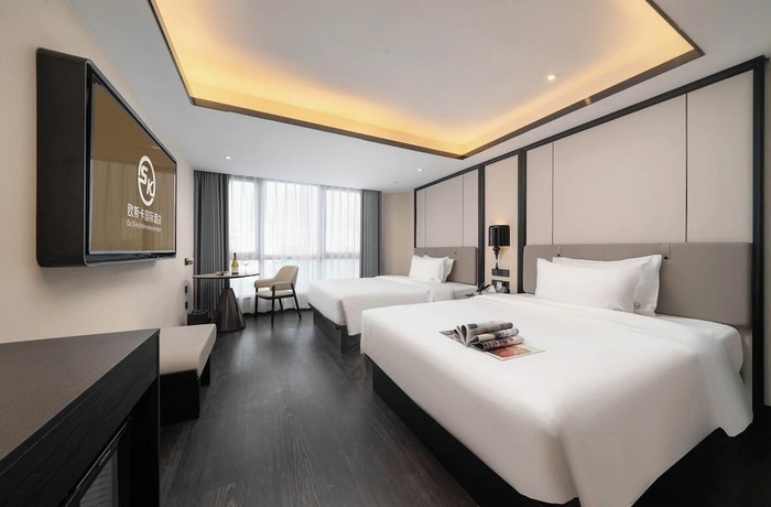 Imagen de la habitación del Hotel OU SI KA HOTEL - HUIYANG. Foto 4