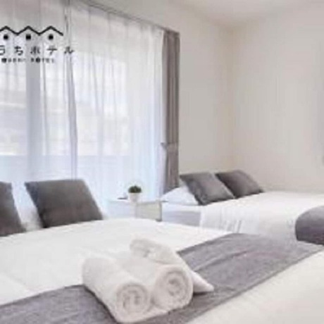 Imagen de la habitación del Hotel OUCHI Miyajimaguchi. Foto 17