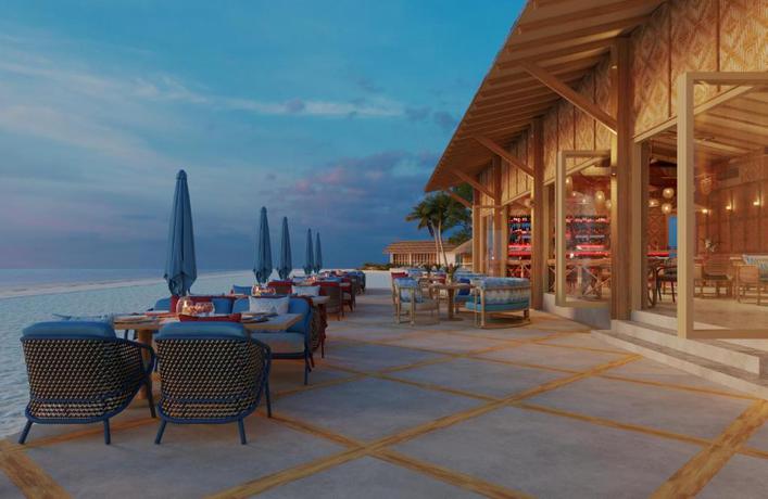 Imagen del bar/restaurante del Hotel OUTRIGGER Phi Phi Island Resort. Foto 3