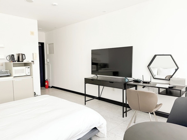 Imagen de la habitación del Hotel OVER THE MOUNTAIN. Foto 14