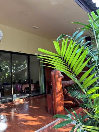 Imagen de la habitación del Hotel OYA International Resort Phuket. Foto 18