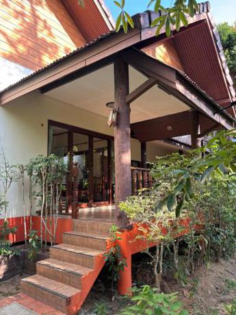 Imagen de la habitación del Hotel OYA International Resort Phuket. Foto 19