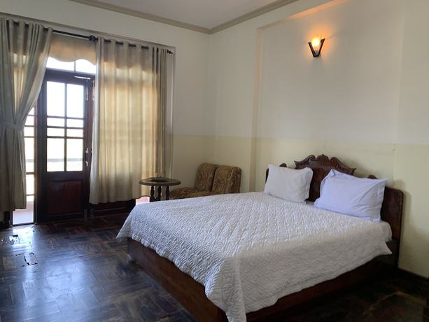 Imagen de la habitación del Hotel OYO 1002 Champa Lang Co Hotel. Foto 4
