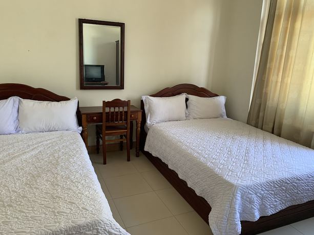Imagen de la habitación del Hotel OYO 1002 Champa Lang Co Hotel. Foto 9