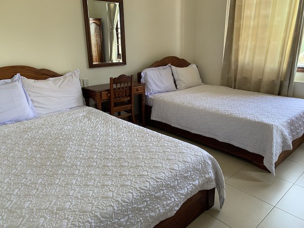 Imagen de la habitación del Hotel OYO 1002 Champa Lang Co Hotel. Foto 11