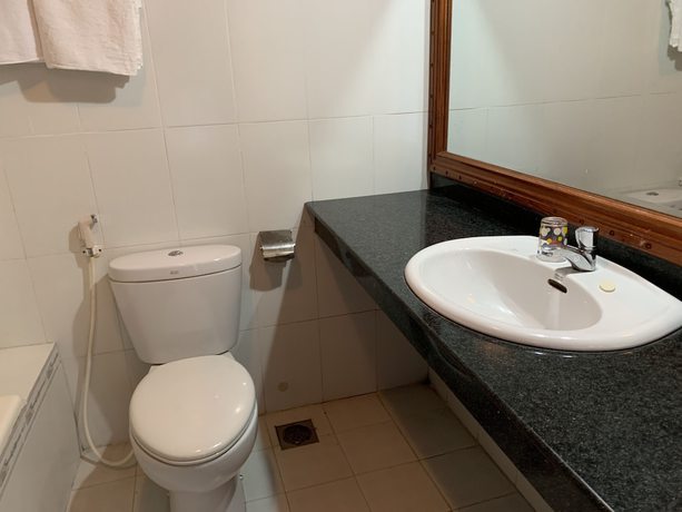 Imagen de la habitación del Hotel OYO 1002 Champa Lang Co Hotel. Foto 17