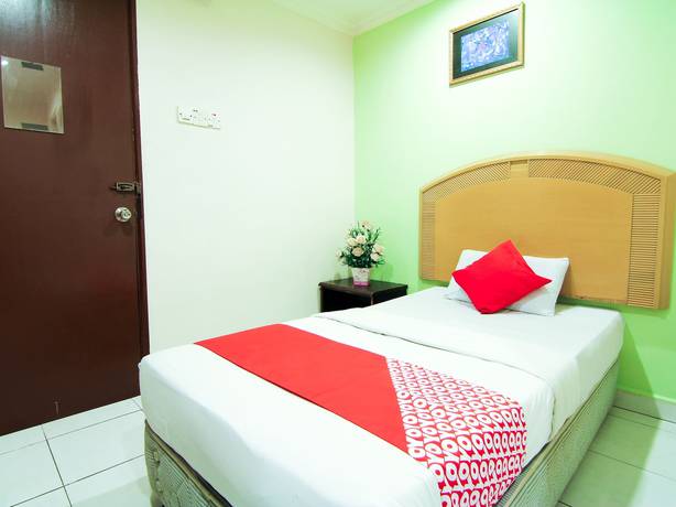 Imagen de la habitación del Hotel OYO 1002 Hotel Sahara Inn Batu Caves. Foto 12