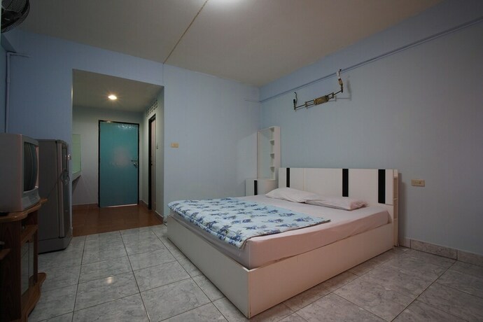 Imagen de la habitación del Hotel OYO 1004 Naklua Mansion. Foto 2