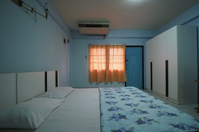 Imagen de la habitación del Hotel OYO 1004 Naklua Mansion. Foto 3