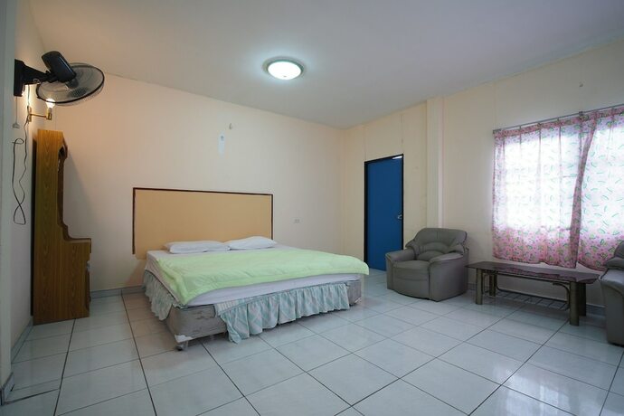 Imagen de la habitación del Hotel OYO 1004 Naklua Mansion. Foto 4