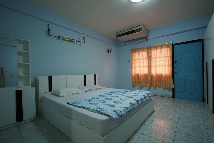Imagen de la habitación del Hotel OYO 1004 Naklua Mansion. Foto 8