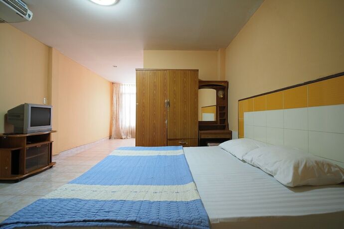 Imagen de la habitación del Hotel OYO 1004 Naklua Mansion. Foto 10