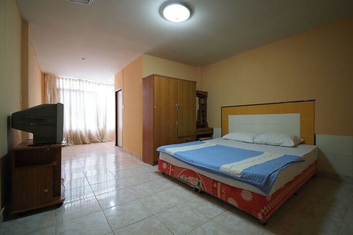 Imagen de la habitación del Hotel OYO 1004 Naklua Mansion. Foto 16