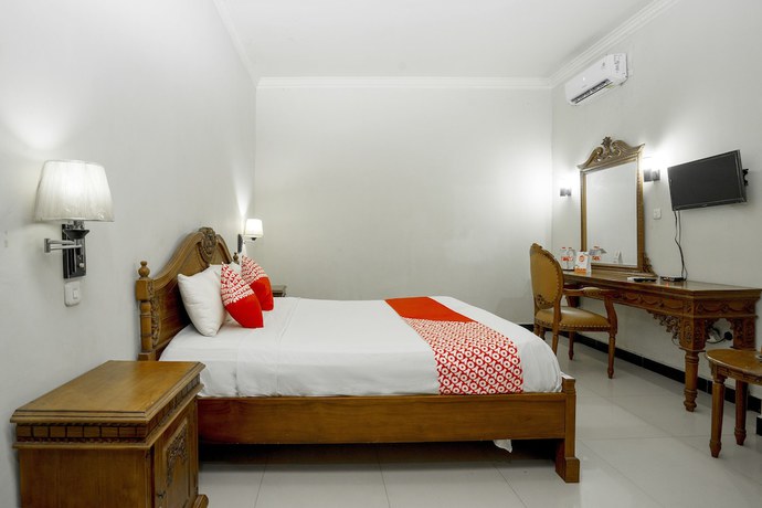 Imagen de la habitación del Hotel OYO 1005 Kumala. Foto 17
