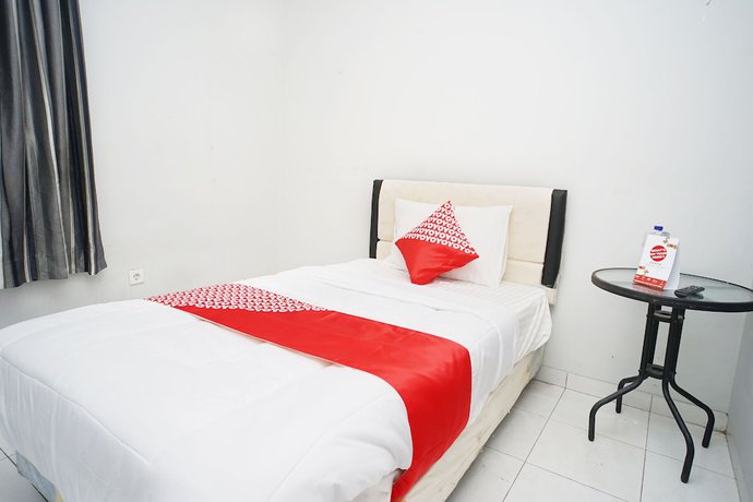 Imagen de la habitación del Hotel OYO 1007 Alletha Guest House 2. Foto 4