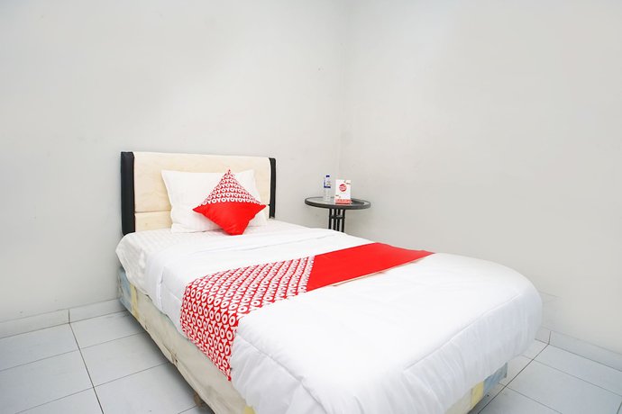 Imagen de la habitación del Hotel OYO 1007 Alletha Guest House 2. Foto 7