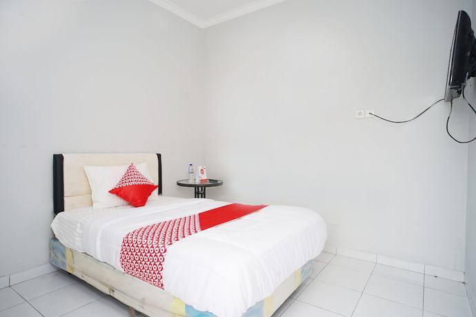 Imagen de la habitación del Hotel OYO 1007 Alletha Guest House 2. Foto 9