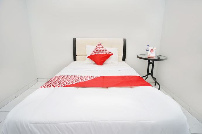 Imagen de la habitación del Hotel OYO 1007 Alletha Guest House 2. Foto 12