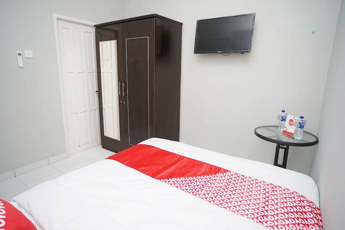 Imagen de la habitación del Hotel OYO 1007 Alletha Guest House 2. Foto 13
