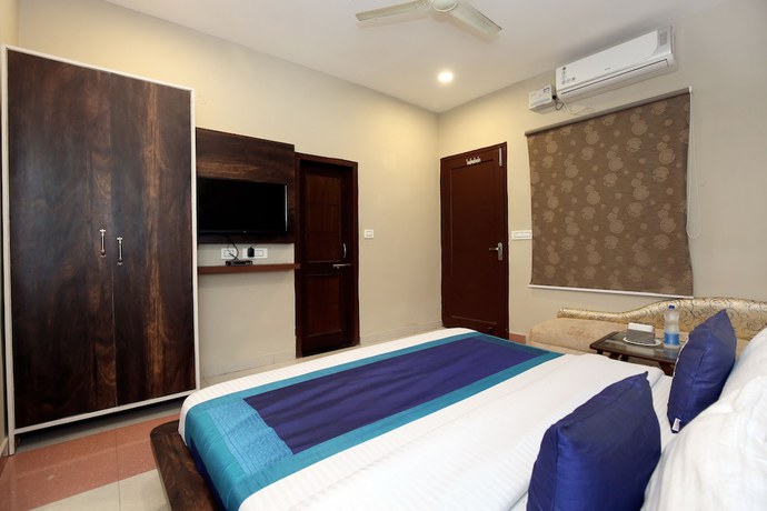 Imagen de la habitación del Hotel OYO 10070 Satkar Regency. Foto 7