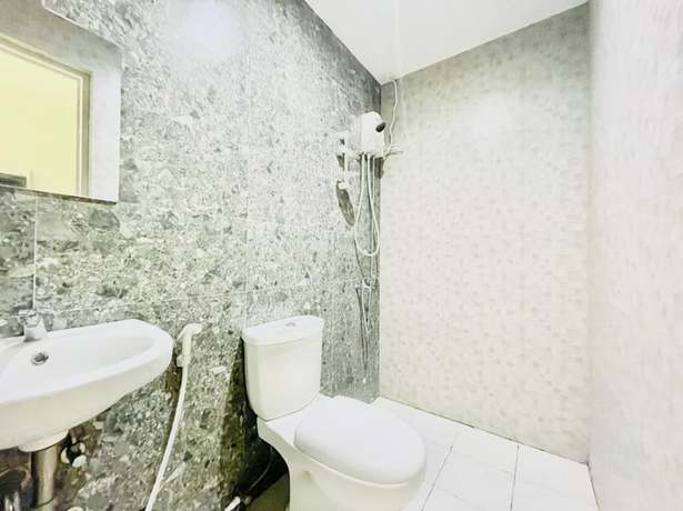 Imagen de la habitación del Hotel OYO 1008 Armond Bed And Breakfast. Foto 6