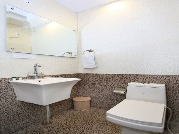 Imagen de la habitación del Hotel OYO 10145 JK. Foto 13