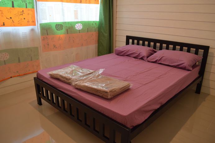 Imagen de la habitación del Hotel OYO 1016 Jade's House. Foto 6