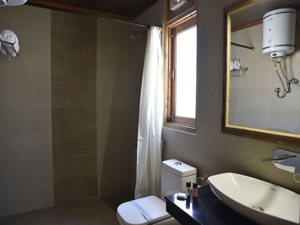 Imagen de la habitación del Hotel OYO 10255 Red Apple. Foto 9