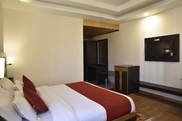 Imagen de la habitación del Hotel OYO 10255 Red Apple. Foto 12