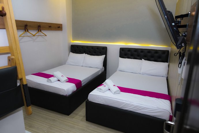 Imagen de la habitación del Hotel OYO 1030 AI. Foto 1