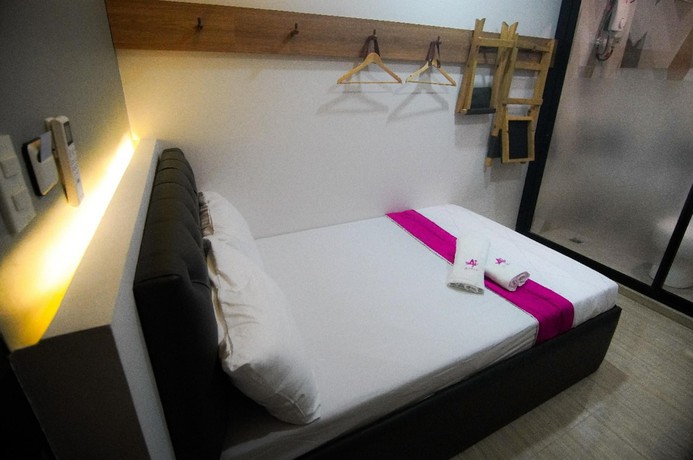 Imagen de la habitación del Hotel OYO 1030 AI. Foto 3