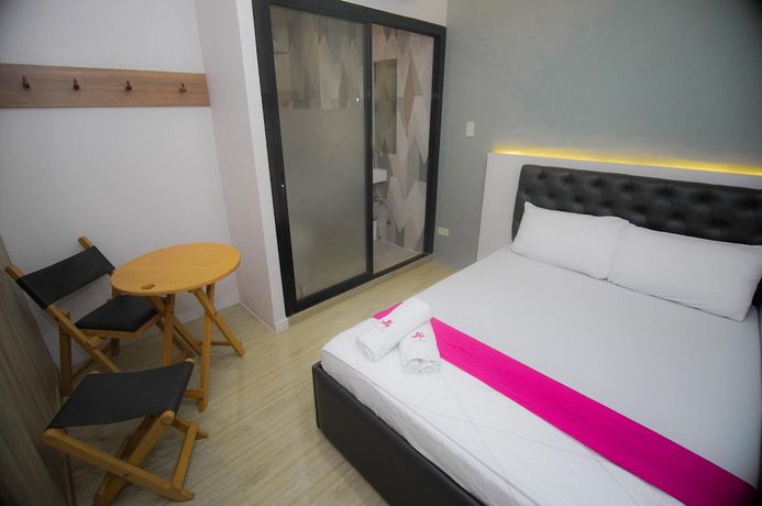 Imagen de la habitación del Hotel OYO 1030 AI. Foto 5