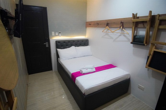 Imagen de la habitación del Hotel OYO 1030 AI. Foto 6