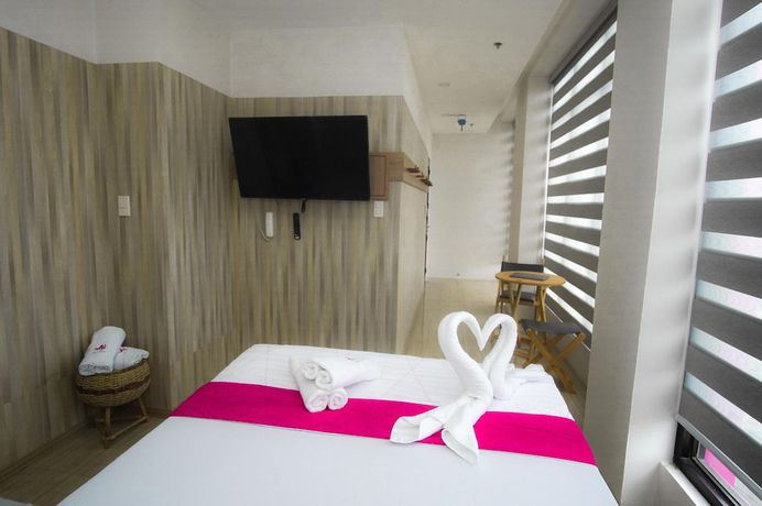 Imagen de la habitación del Hotel OYO 1030 AI. Foto 8