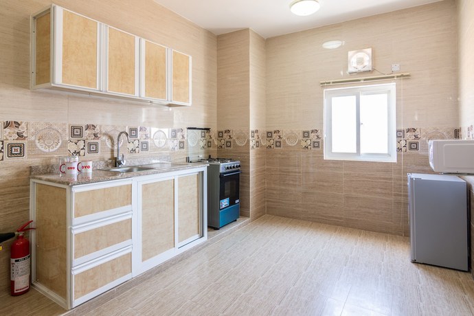 Imagen de la habitación del Hotel OYO 104 Loban Apartment. Foto 4