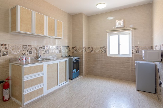 Imagen de la habitación del Hotel OYO 104 Loban Apartment. Foto 8